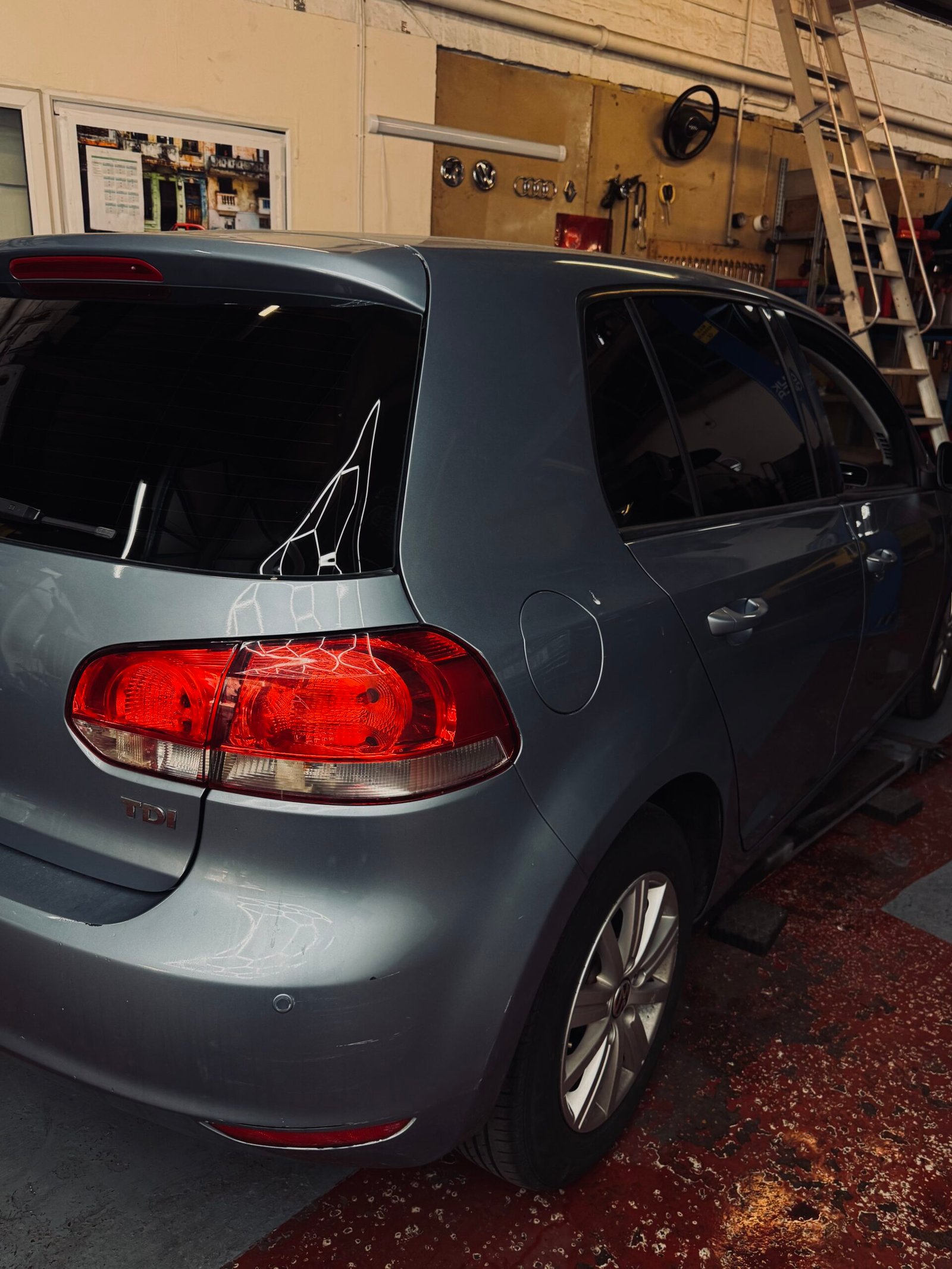 Volkswagen Golf MK6 rea side window tint transformation