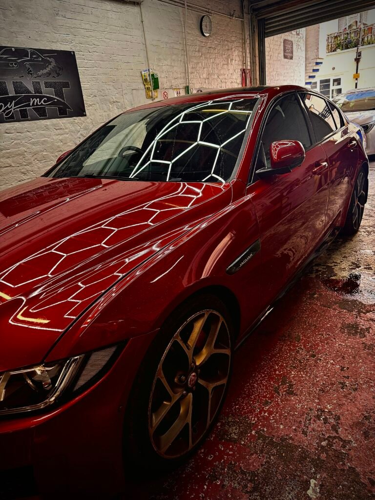 Red Jaguar with premium car window tint